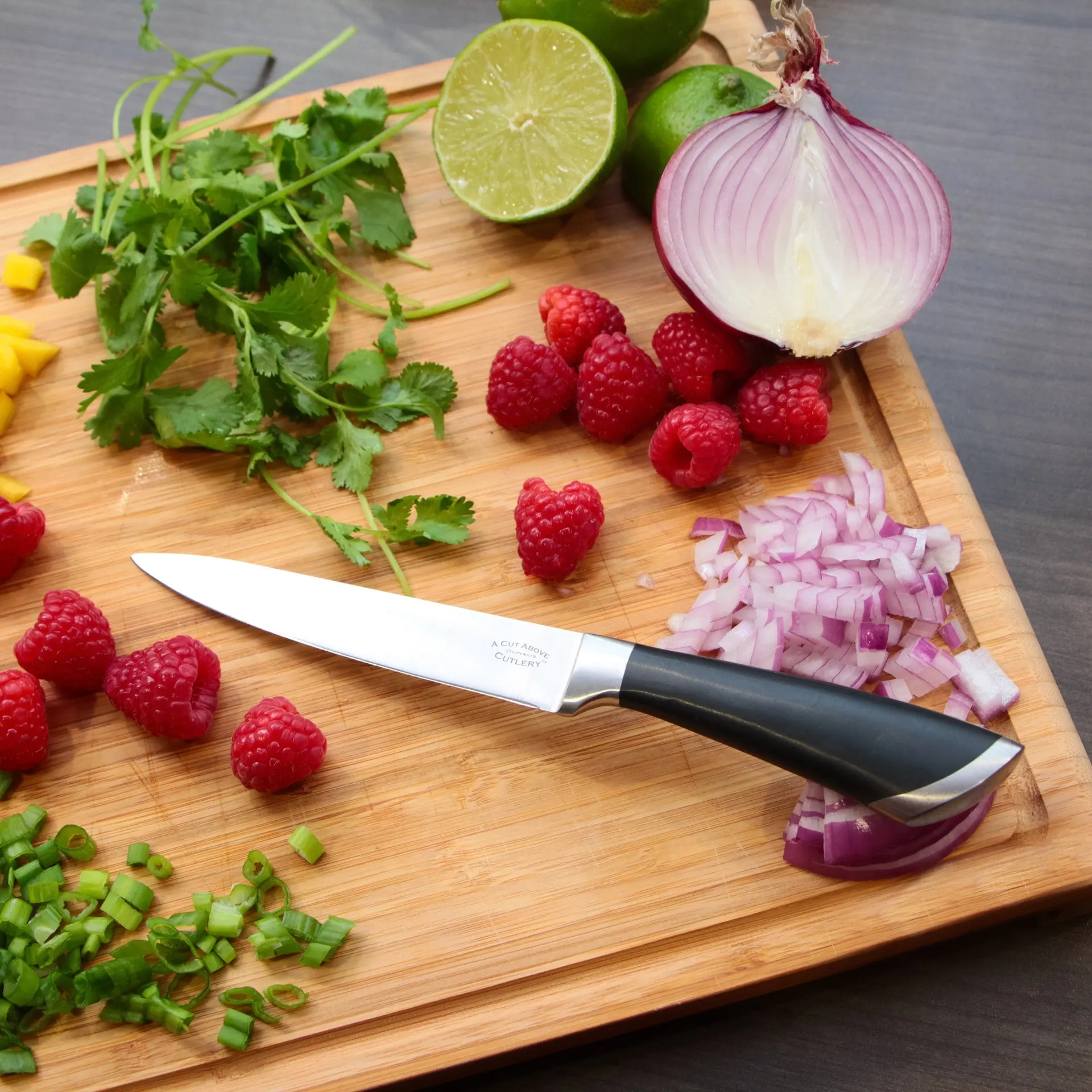 A Cut Above Cutlery Utility Knife. Forged Stainless Steel Construction, Slip Resistant Grip, 5 Inch Blade Holds Edge Well So You Sharpen Less Often. Peel, Core, Pare, Fruit and Vegetables, Prep Sushi